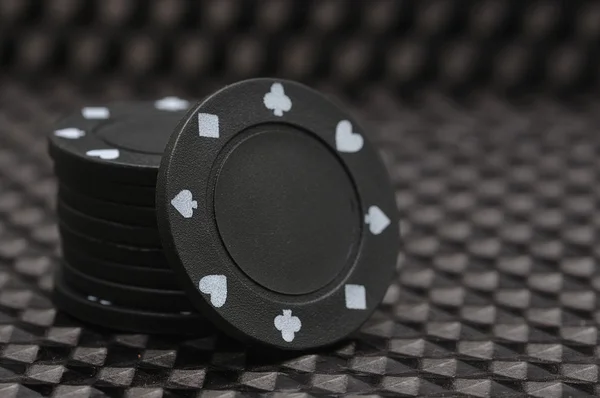 A stack of black poker chips — Stock Photo, Image