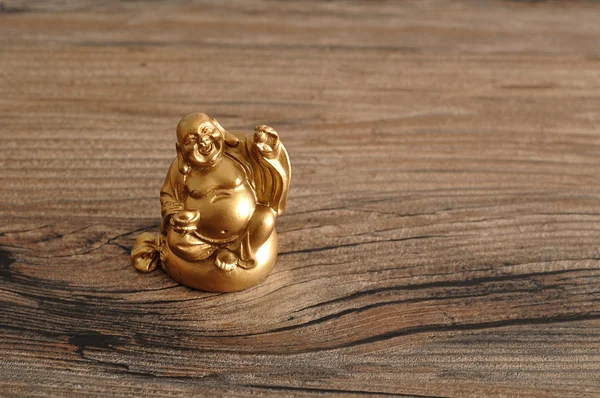 Figurinha de rir e alegre Buda dourado — Fotografia de Stock