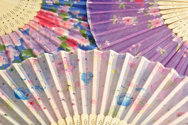 Collection of colorful hand fans