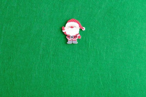 Santa isolated on a green background — Stock Photo, Image