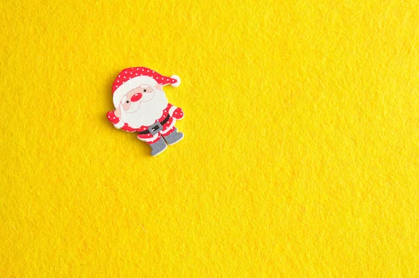 Santa isolated on a yellow background — Stock Photo, Image