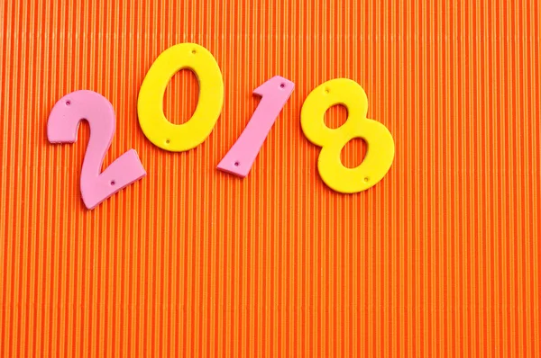 2018 in roze en gele getallen — Stockfoto