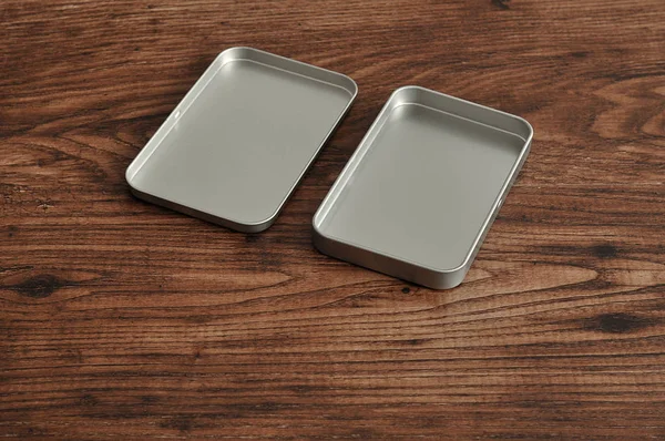 A small empty metal tin with a lid — Stock Photo, Image