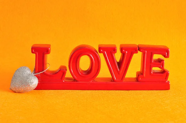 Miłość słowo serce srebrny Brokat — Zdjęcie stockowe