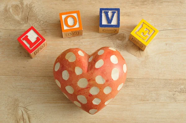 Valentine\'s Day. Love spelled with colorful alphabet blocks