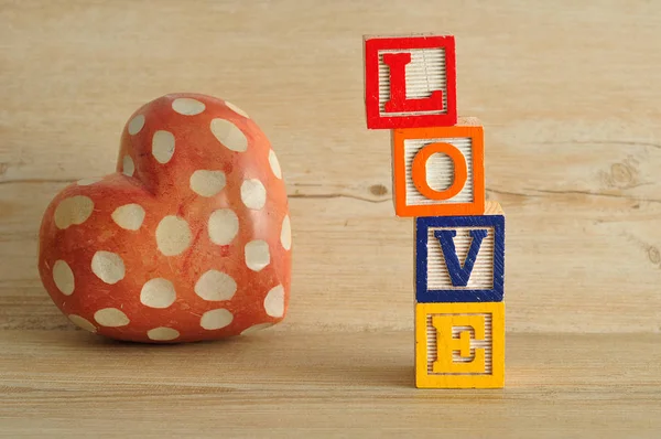 Valentine\'s Day. Love spelled with colorful alphabet blocks