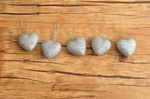Día de San Valentín. Seis corazones de plata — Foto de Stock