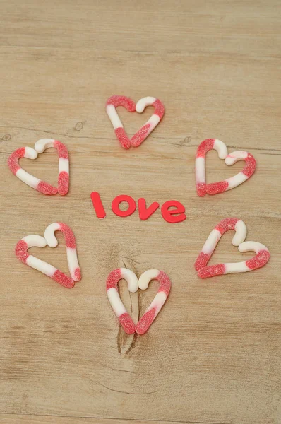 Wykonane z laski cukierki z słowo miłość serca — Zdjęcie stockowe