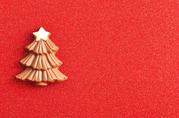 A chocolate christmas tree decorated with a white star — Stock Photo, Image