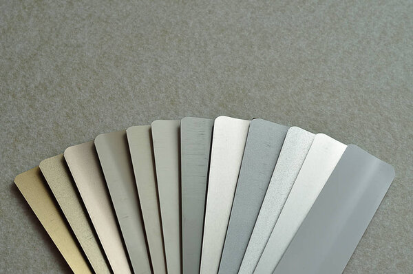 A swatch with different colors of aluminum blinds