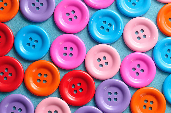 A full frame of colorful buttons for sewing