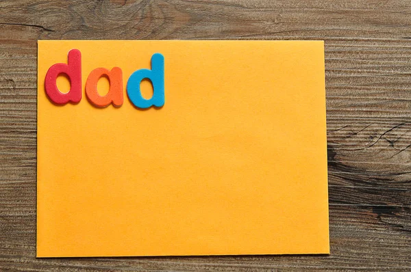 Ο μπαμπάς λέξη με μια σημείωση πορτοκαλί — Φωτογραφία Αρχείου