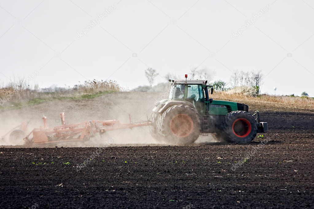 Plowing with tractor