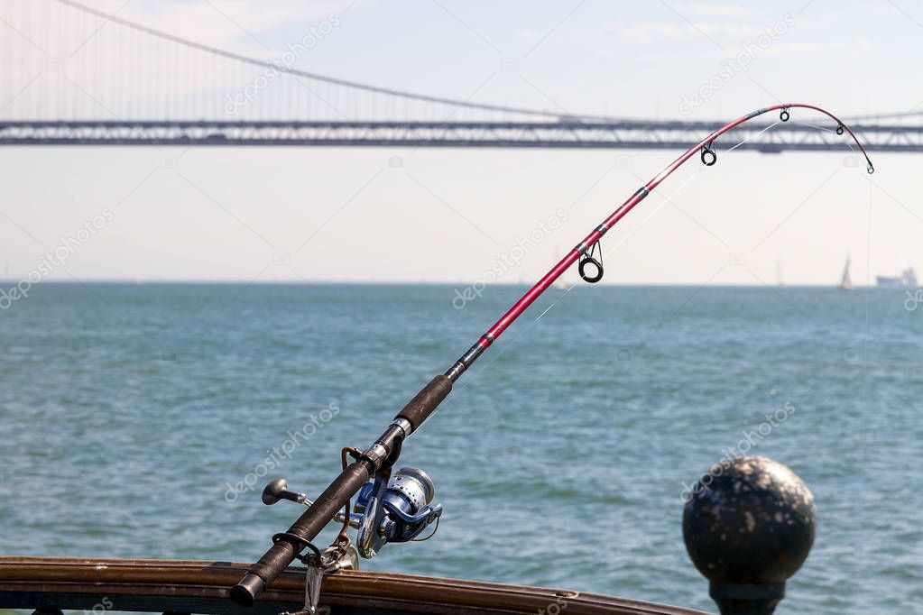 Fishing Rod on the Pier in San Francisco Bay CA USA