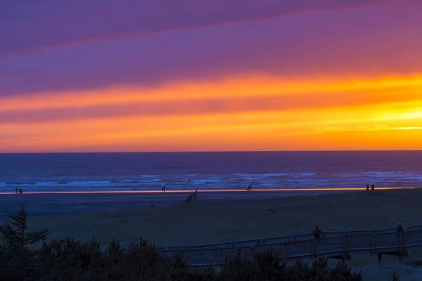 Colorful sunset along boardwalk in Long Beach Peninsula Washington State