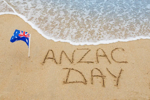 Ημέρα Anzac λέξεις πάνω στην άμμο — Φωτογραφία Αρχείου