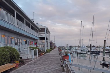 Sunset over buildings, boats and the docks on Taylor Creek off of Front Street in Beaufort, the third-oldest town in North Carolina