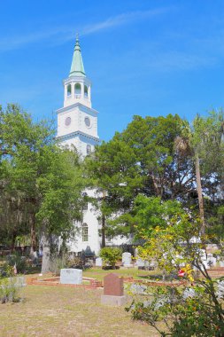 BEAUFORT, SOUTH CAROLINA - APRIL 16 2017: Main building, spire and part of the graveyard at the parish church of St. Helena. The current building dates from 1842 and hosts an Anglican congregation.