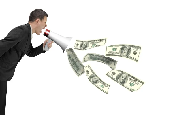 Businessman hold megaphone with dollar bills spraying out — Stock Photo, Image