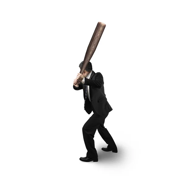 Businessman holding baseball bat in batting stance — Stock Photo, Image