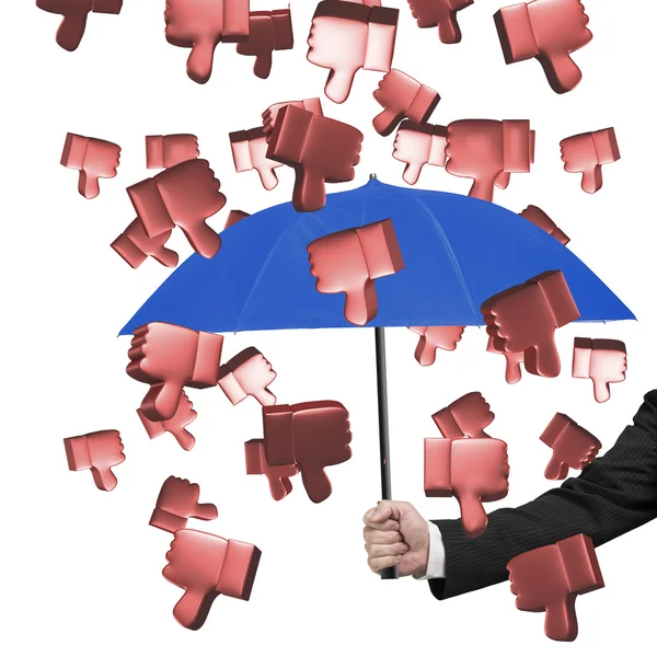 Hand holding umbrella to prevent 3D thumbs down — Stock Photo, Image