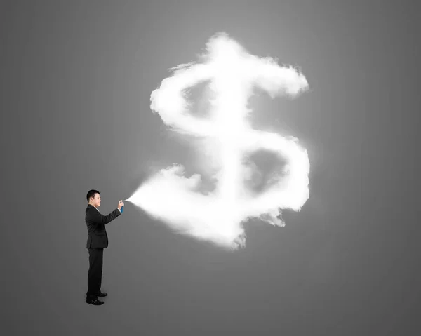 Businessman spraying out dollar sign shape cloud — Stock Photo, Image