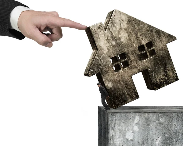 Man holding old house on concrete wall with hand helping — Stock Photo, Image