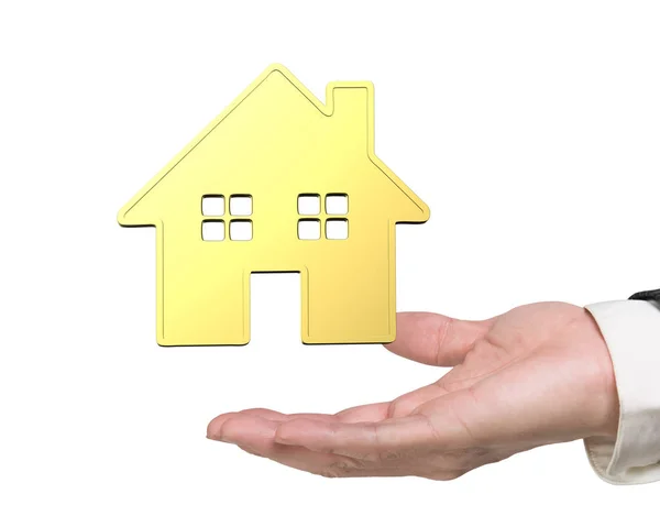 Man's hand showing golden house — Stock Photo, Image