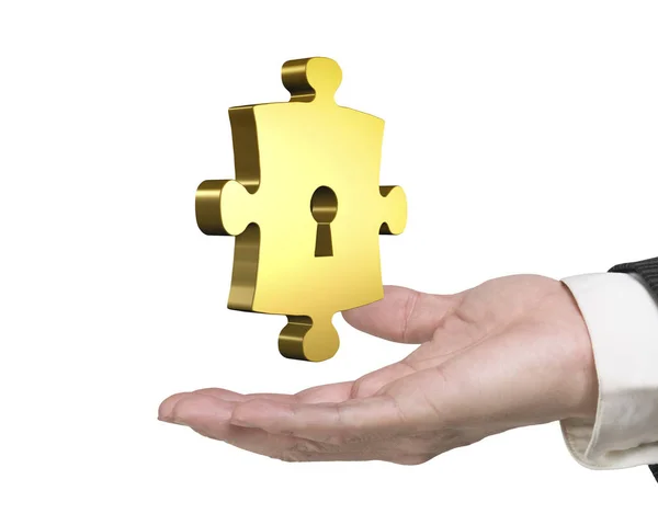 Человек держит золотой кусочек головоломки с замочной скважины — стоковое фото