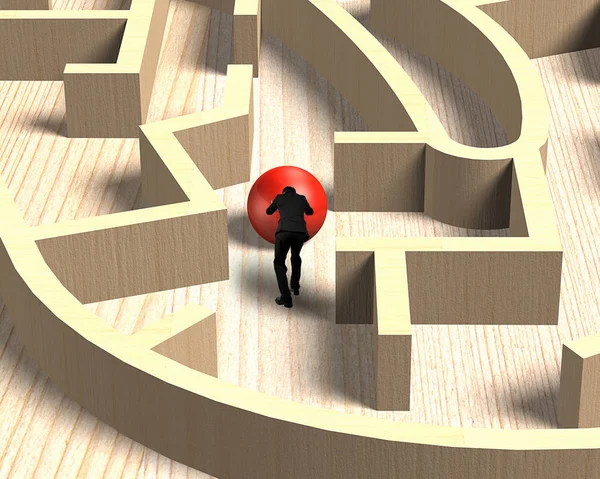 Man pushing red ball in wooden maze game — Stock Photo, Image