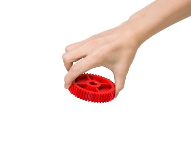 Kırmızı bir dişli tutan el