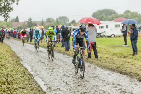 The Peloton on a Cobblestone Road - Tour de France 2014 — Stock Photo, Image