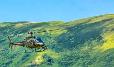 Helicopter in Pyrenees Mountains clipart