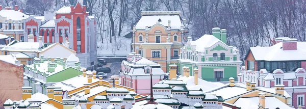 Colorful rooftops covered with snow — Stock Photo, Image