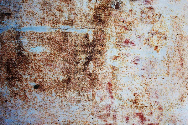 Rusty metal surface painted with paint and cracked from time to time — Stock Photo, Image