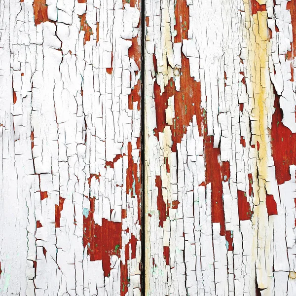 Clôture en bois peint avec une peinture minable — Photo