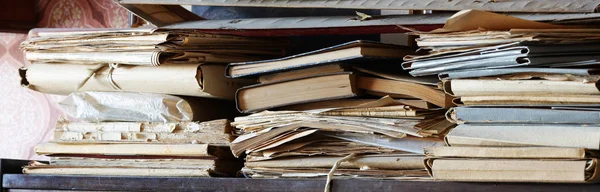 old books and magazines on a shelf