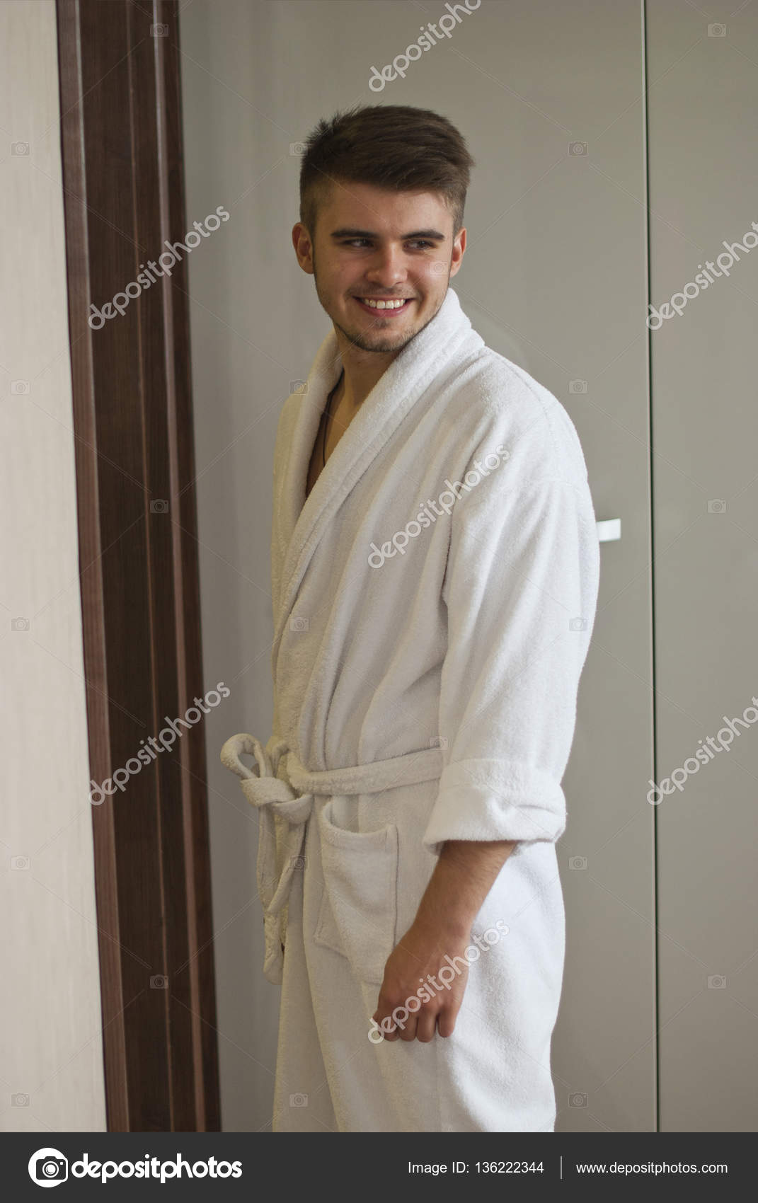 man wearing bathrobe
