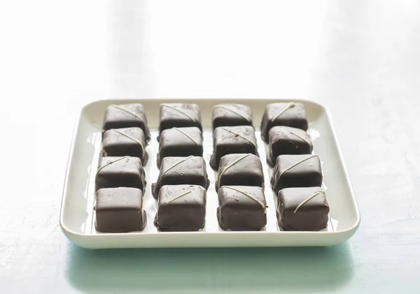 Chocolate Candies White Plate — Stock Photo, Image