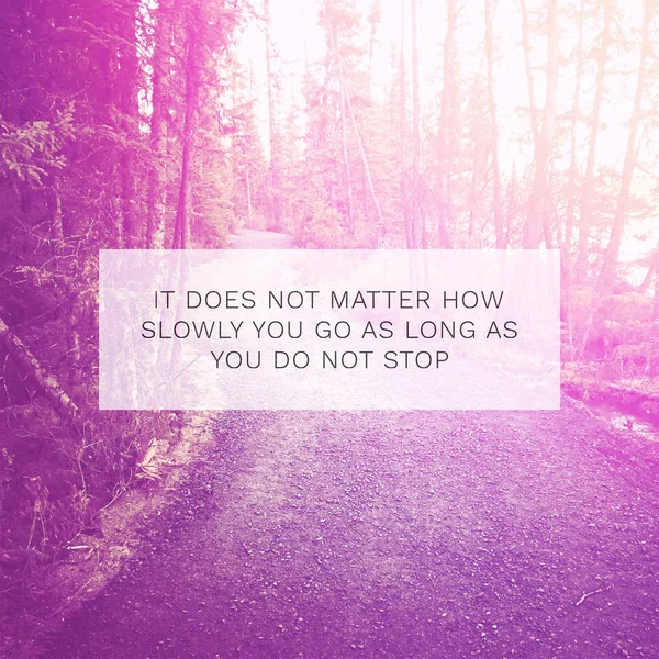 Quote - it does not matter how slowly you go as long as you do not stop — 스톡 사진