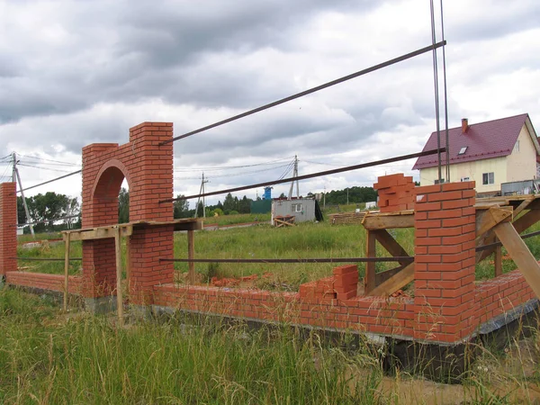 Construction of a New Brick Fence Royalty Free Stock Photos