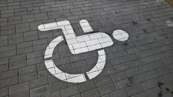 disabled parking tile sign.