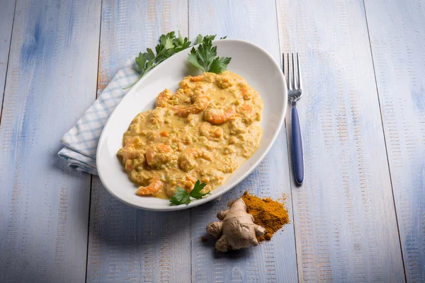 Garnelen mit Curry-Ingwer und Kokossoße — Stockfoto