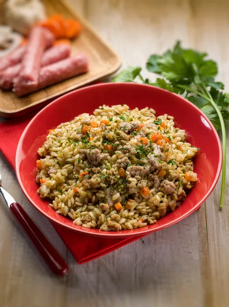 Rice with sausage, selective focus — Stock Photo, Image