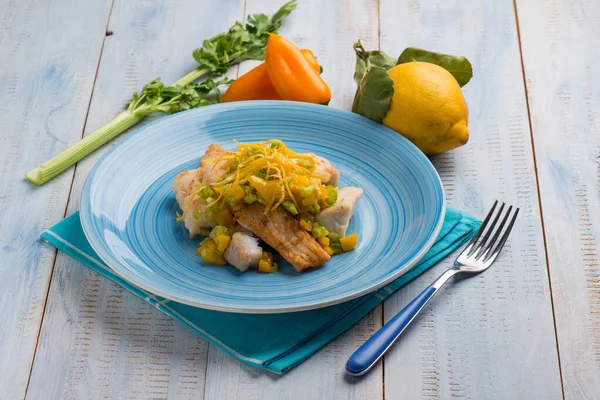 Cod fillet with celery capsicum and orange peel — Stock Photo, Image