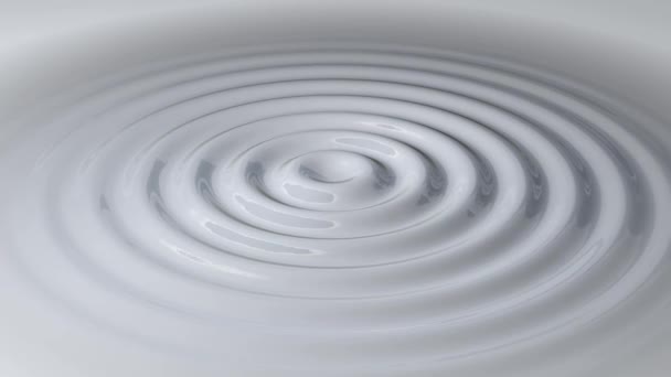 Kreisförmige Wellen in einer weißen Flüssigkeit — Stockvideo