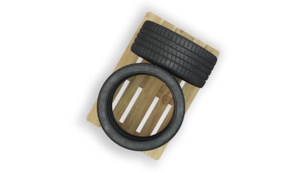 Top View Turning Sport Tires Put Straight Wood Pallet White — Stock Video