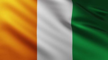 Fildişi Sahili 'nin büyük bayrağı dalga desenleriyle rüzgarda dalgalanıyor.