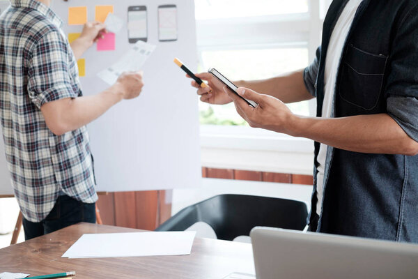 Web designer planning application for mobile phone