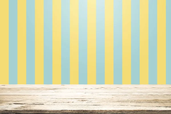 Empty wooden table over yellow and aqua background. — Stock Photo, Image